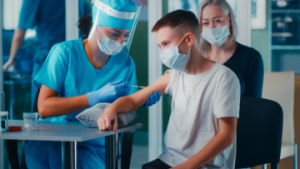 doctor-giving-boy-vaccine