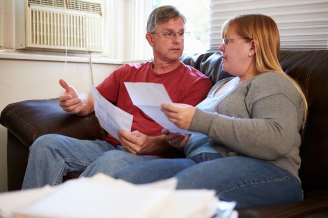 Couple reviewing bills