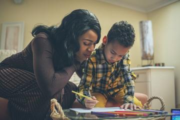 Mom with child drawing